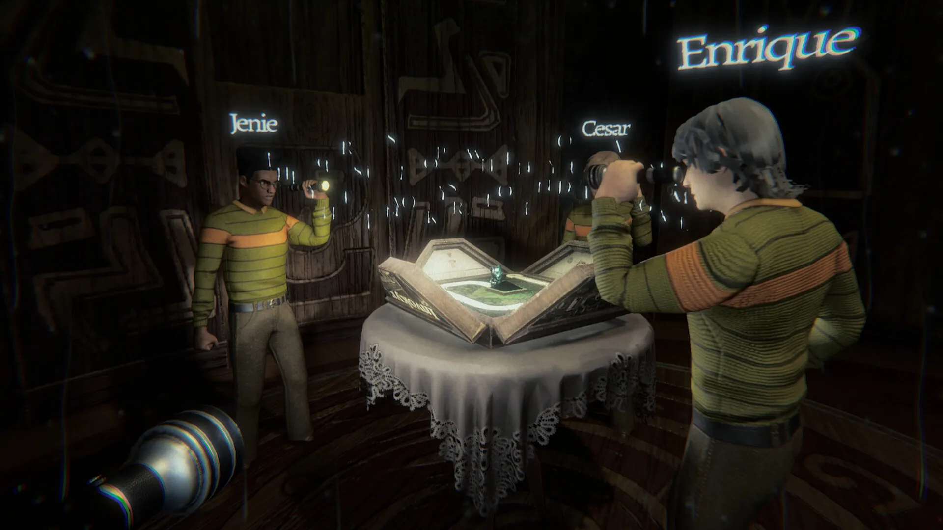 Three Invokyr players named Jenie, Cesar, and Enrique stand around an open board-game case on a lace-covered table.