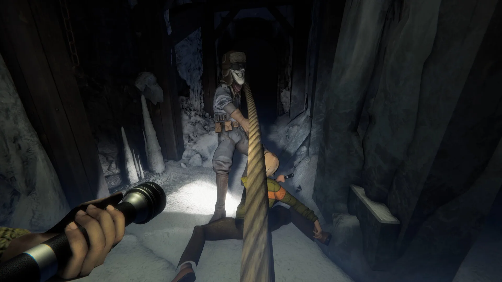 Invokyr ice-cave scene with a masked figure in an aviator cap standing over a fallen player.